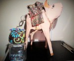 Paper mache pig with saddle trinket holder